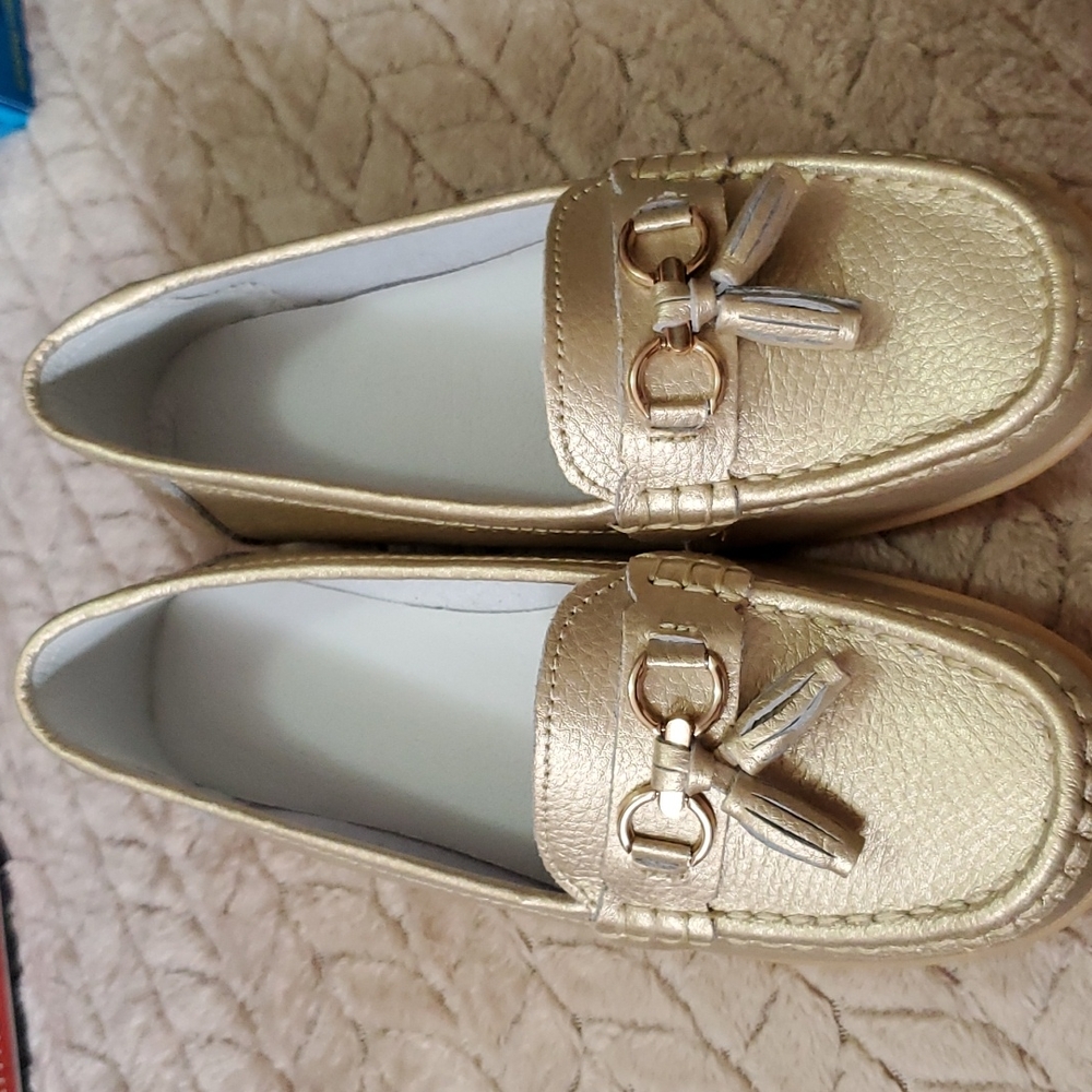 Women's Gold tassel loafer New. Size 36 EUR